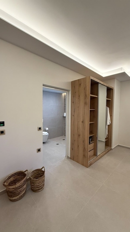 Imagen de la habitación del Hotel The Noverian Antama Organic Beach Resort Chania. Foto 10