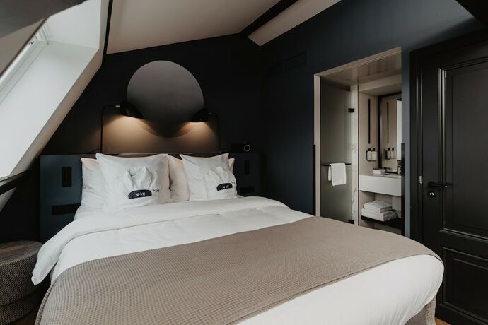 Imagen de la habitación del Hotel The Nox Utrecht. Foto 12
