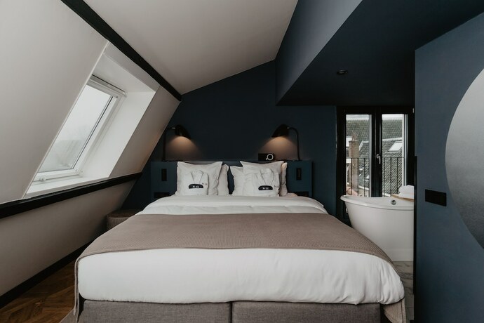 Imagen de la habitación del Hotel The Nox Utrecht. Foto 16