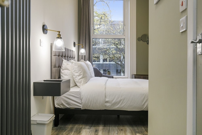 Imagen de la habitación del Hotel The Number 11 By The Warren Collection. Foto 3