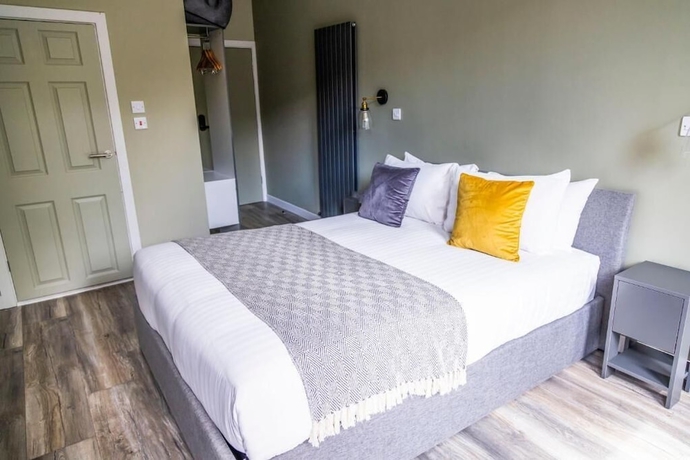Imagen de la habitación del Hotel The Number 11 By The Warren Collection. Foto 4