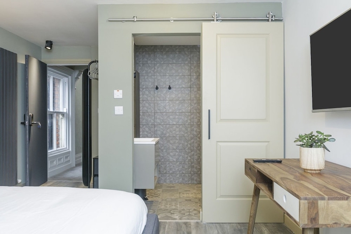 Imagen de la habitación del Hotel The Number 11 By The Warren Collection. Foto 7