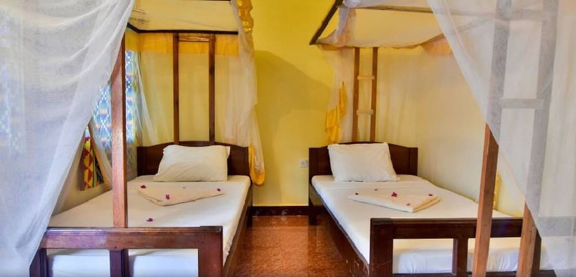 Imagen de la habitación del Hotel The Nungwi Inn. Foto 14