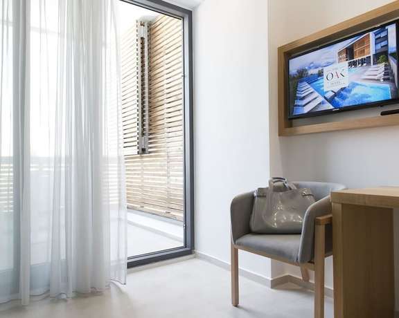 Imagen de la habitación del Hotel The OAK Keramoti. Foto 7