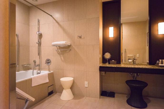 Imagen de la habitación del Hotel The ORIENT. Foto 10