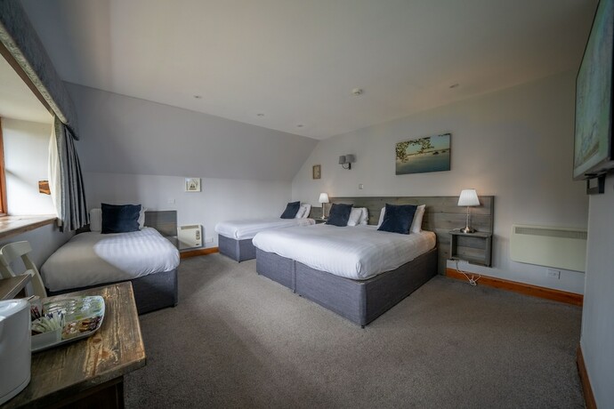 Imagen de la habitación del Hotel The Oak Tree Inn. Foto 15