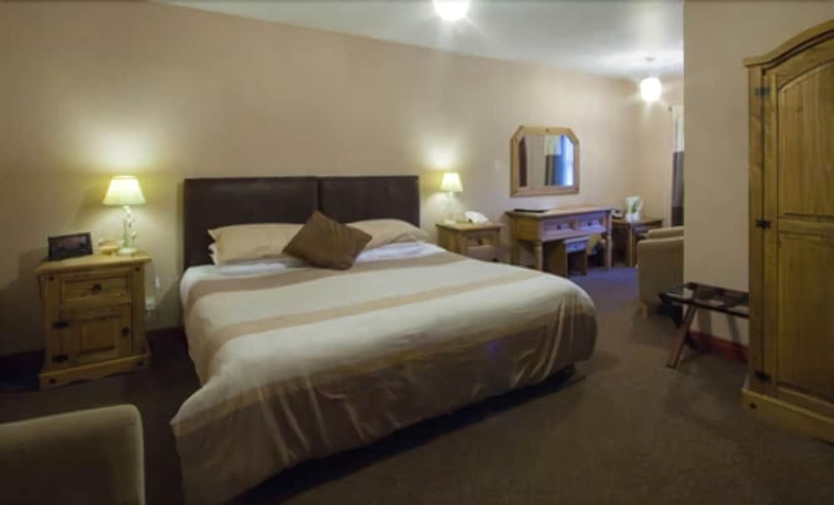 Imagen de la habitación del Hotel The Oaks. Foto 14
