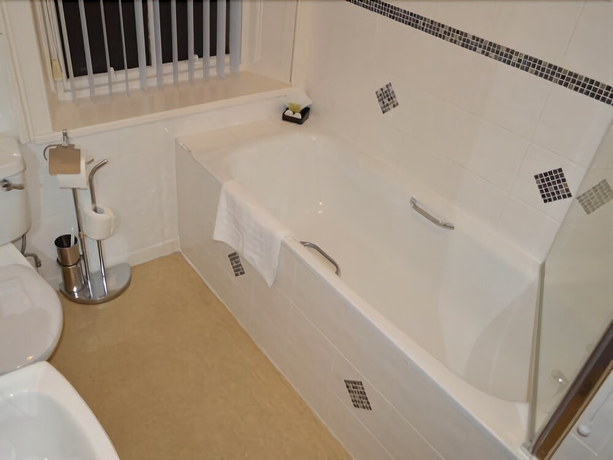 Imagen de la habitación del Hotel The Oaks. Foto 15