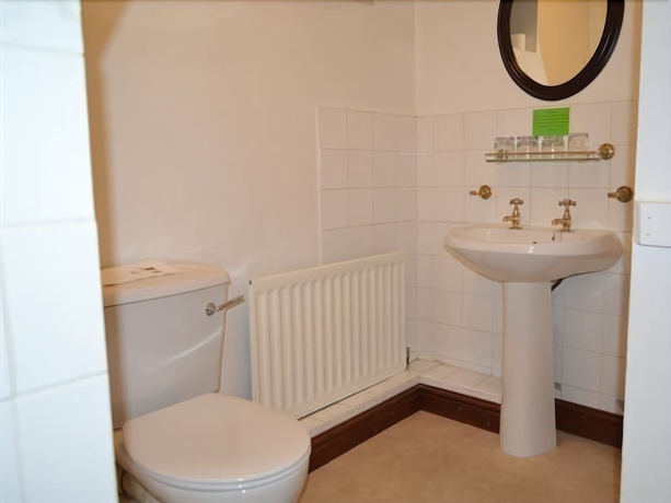 Imagen de la habitación del Hotel The Oaks. Foto 16