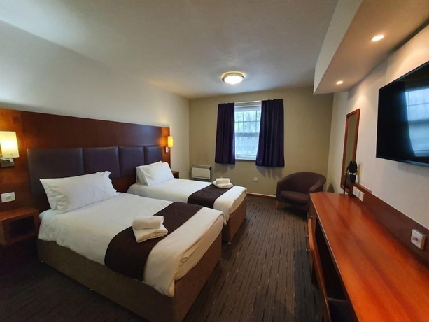 Imagen de la habitación del Hotel The Oakwood by Roomsbooked. Foto 5