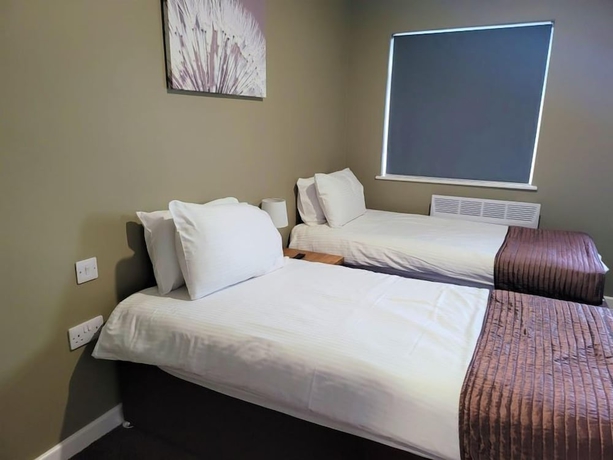 Imagen de la habitación del Hotel The Oakwood by Roomsbooked. Foto 9