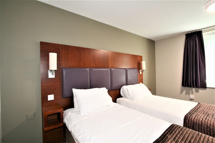 Imagen de la habitación del Hotel The Oakwood by Roomsbooked. Foto 10