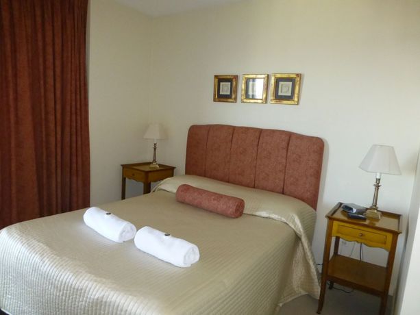 Imagen de la habitación del Hotel The Oasis Apartments. Foto 7