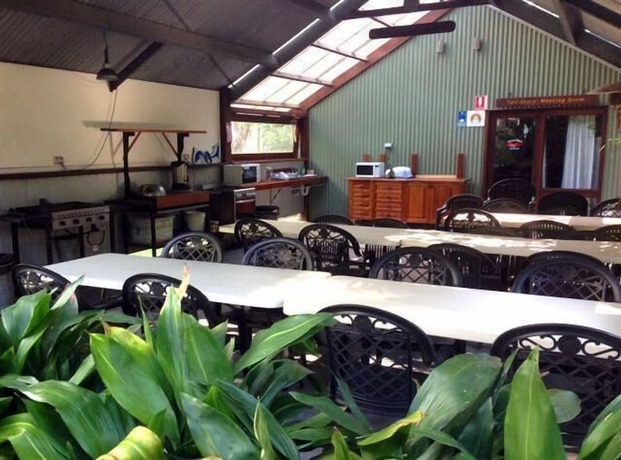 Imagen del bar/restaurante del Hotel The Oasis At One Mile Beach. Foto 12