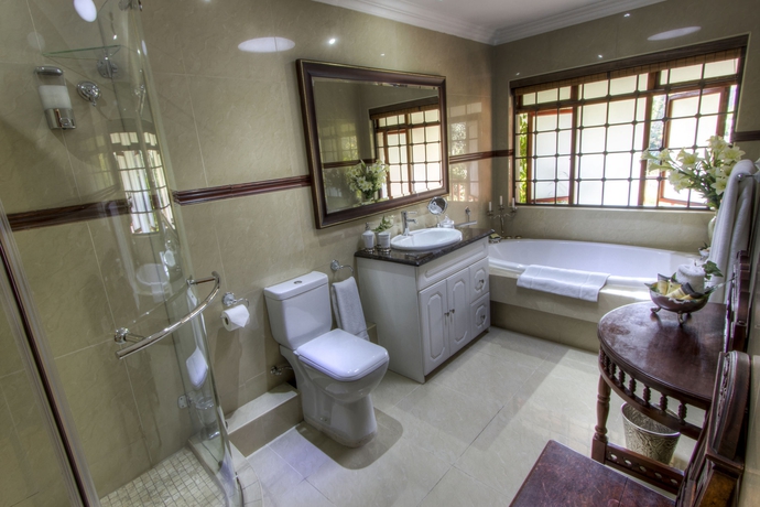 Imagen de la habitación del Hotel The Oasis Boutique. Foto 5
