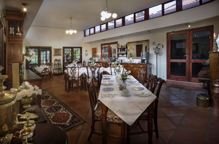 Imagen del bar/restaurante del Hotel The Oasis Boutique. Foto 2