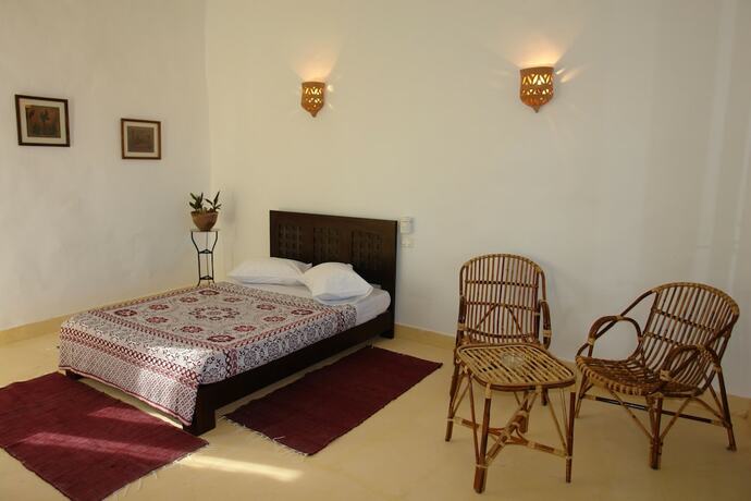 Imagen de la habitación del Hotel The Oasis Dive Resort. Foto 17