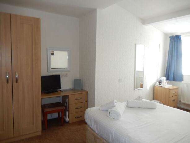 Imagen de la habitación del Hotel The Oasis. Foto 11