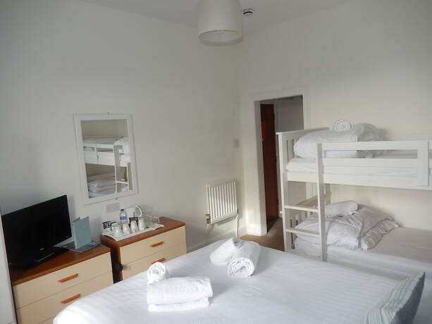Imagen de la habitación del Hotel The Oasis. Foto 13