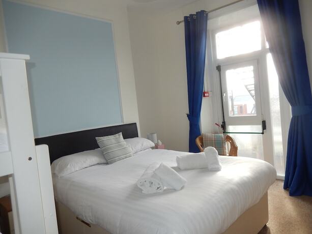 Imagen de la habitación del Hotel The Oasis. Foto 19