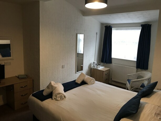 Imagen de la habitación del Hotel The Oasis. Foto 20