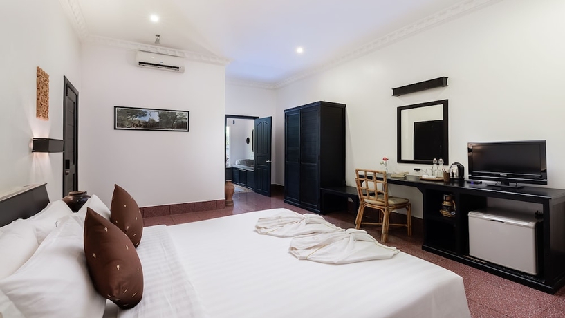 Imagen de la habitación del Hotel The Oasis Harbor. Foto 9