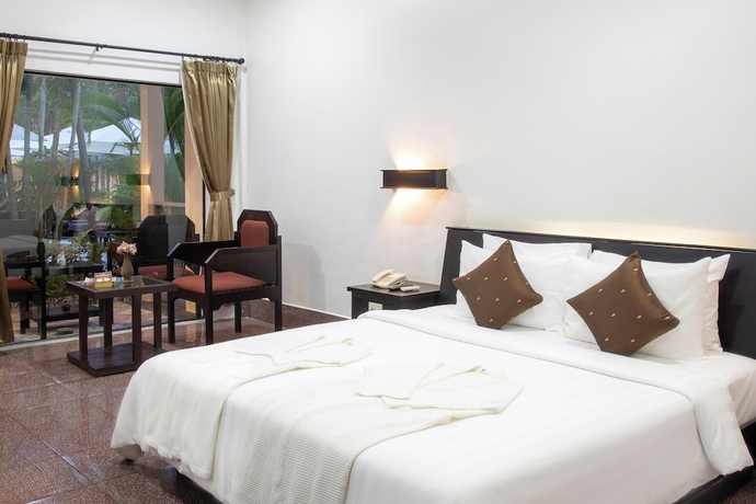Imagen de la habitación del Hotel The Oasis Harbor. Foto 10
