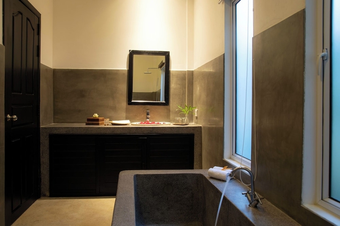 Imagen de la habitación del Hotel The Oasis Harbor. Foto 14