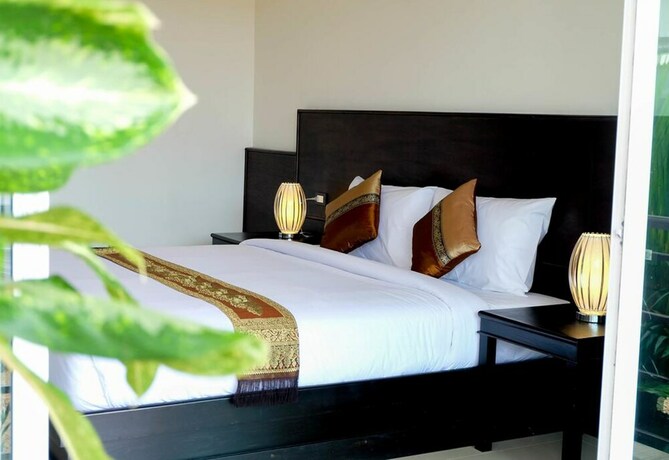 Imagen de la habitación del Hotel The Oasis Khaolak Resort. Foto 20