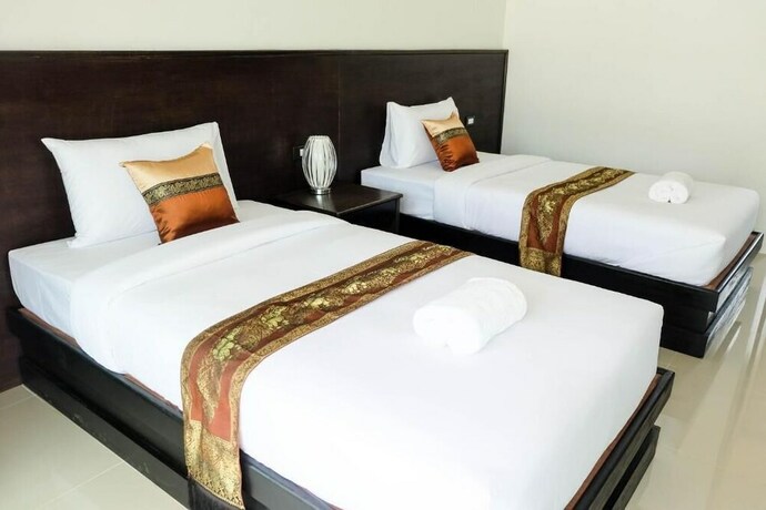 Imagen de la habitación del Hotel The Oasis Khaolak Resort. Foto 31