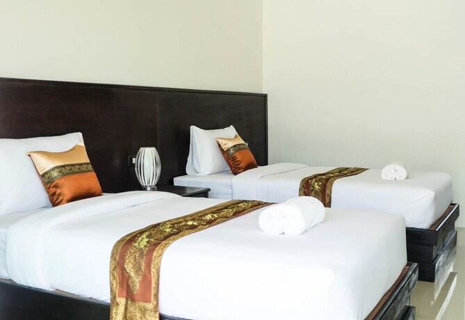 Imagen de la habitación del Hotel The Oasis Khaolak Resort. Foto 32