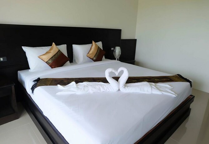 Imagen de la habitación del Hotel The Oasis Khaolak Resort. Foto 38