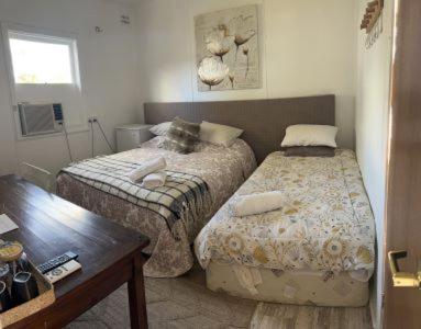 Imagen de la habitación del Hotel The Oasis Motel. Foto 18