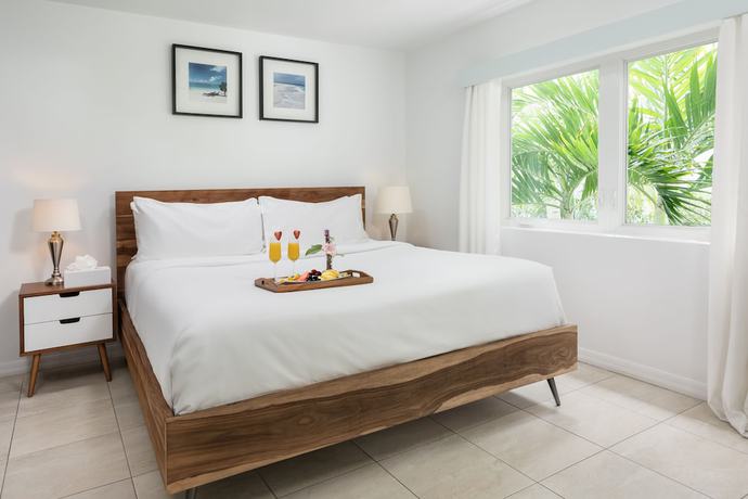 Imagen de la habitación del Hotel The Oasis at Grace Bay. Foto 2