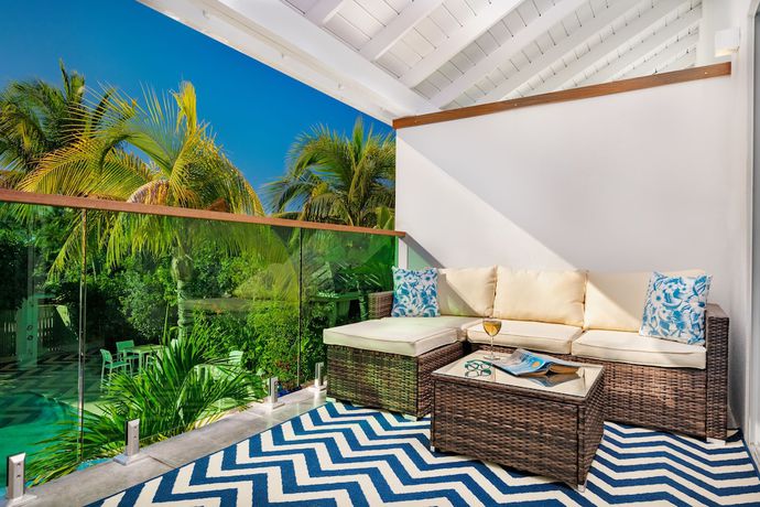 Imagen de la habitación del Hotel The Oasis at Grace Bay. Foto 3