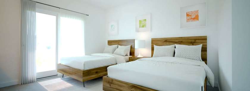 Imagen de la habitación del Hotel The Oasis at Grace Bay. Foto 4