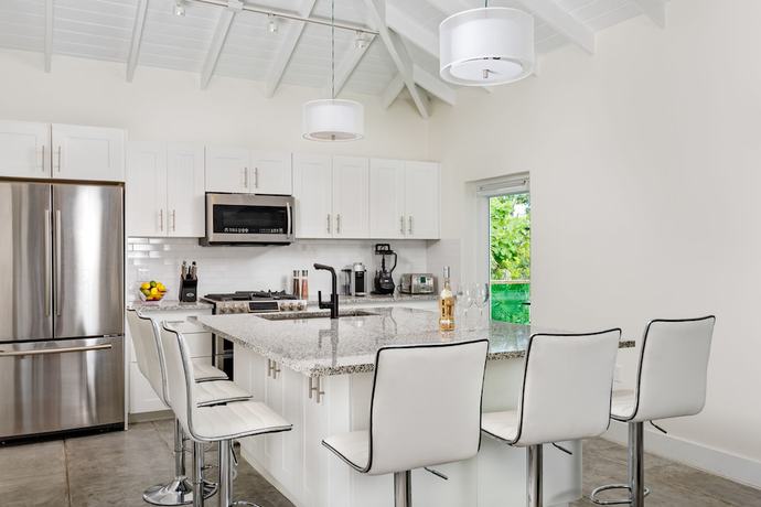 Imagen de la habitación del Hotel The Oasis at Grace Bay. Foto 7