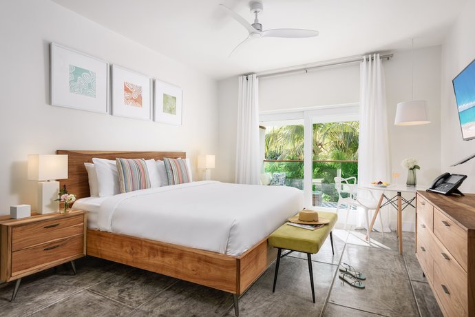 Imagen de la habitación del Hotel The Oasis at Grace Bay. Foto 9