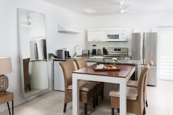 Imagen de la habitación del Hotel The Oasis at Grace Bay. Foto 12