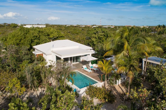 Imagen de la habitación del Hotel The Oasis at Grace Bay. Foto 16