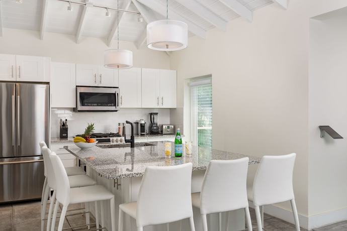 Imagen de la habitación del Hotel The Oasis at Grace Bay. Foto 17