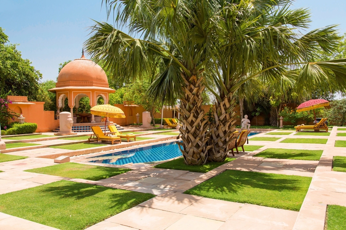 Imagen de la piscina del Hotel The Oberoi Rajvilas. Foto 18
