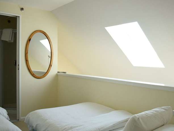 Imagen de la habitación del Hotel The Ocean Colony Beach And Tennis Club. Foto 12