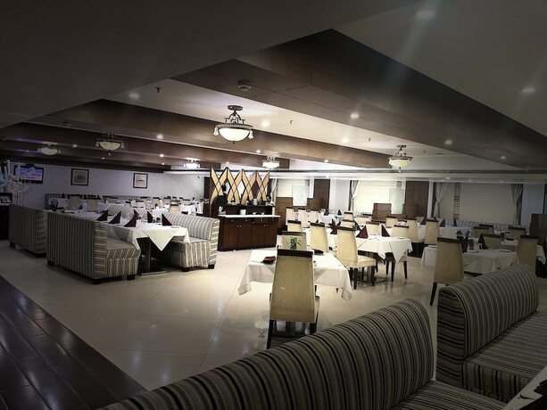 Imagen del bar/restaurante del Hotel The Ocean Pearl. Foto 10