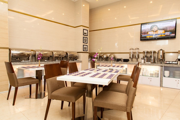 Imagen del bar/restaurante del Hotel The Odys Boutique. Foto 2