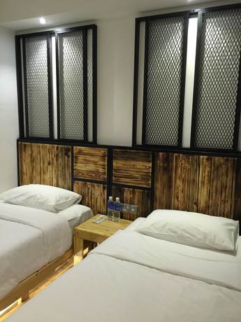 Imagen de la habitación del Hotel The Oikos. Foto 5