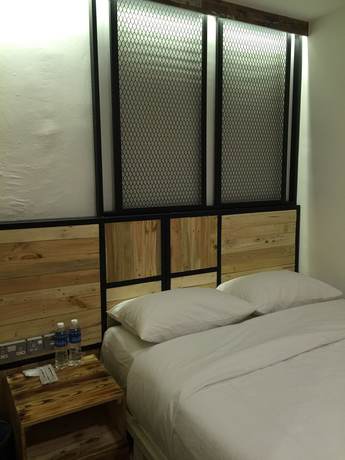 Imagen de la habitación del Hotel The Oikos. Foto 7