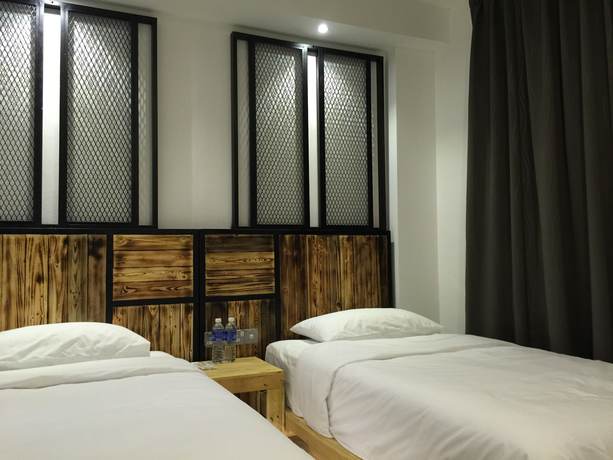 Imagen de la habitación del Hotel The Oikos. Foto 8