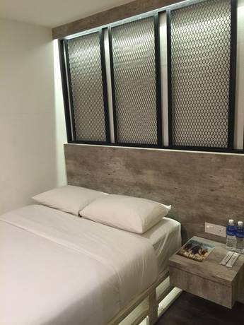 Imagen de la habitación del Hotel The Oikos. Foto 9