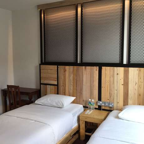 Imagen de la habitación del Hotel The Oikos. Foto 10